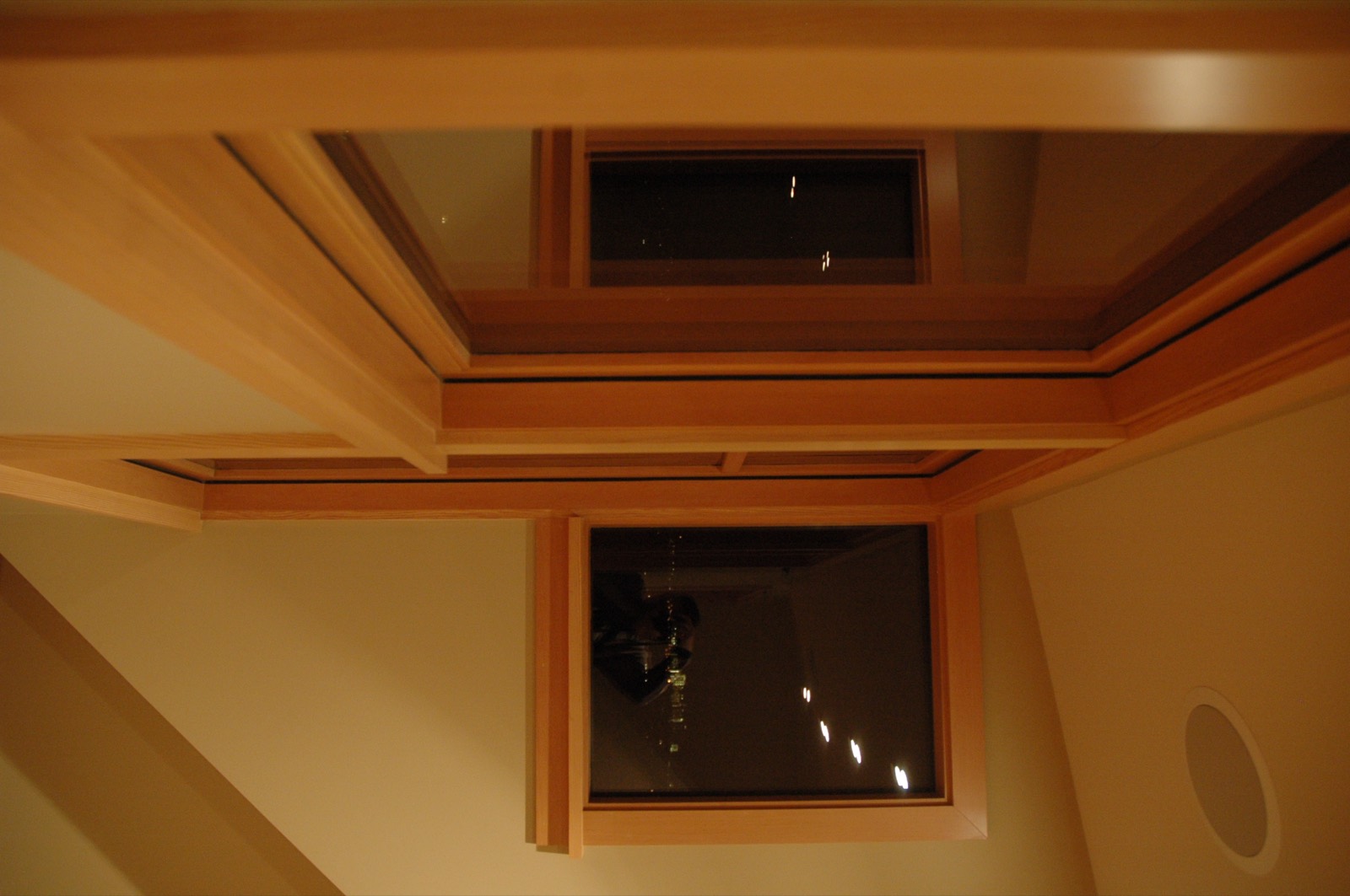 Wood window casings at dusk, set to a deliberate proportion