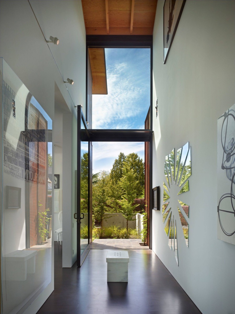 Gallery entry with full-height door and fir ceiling