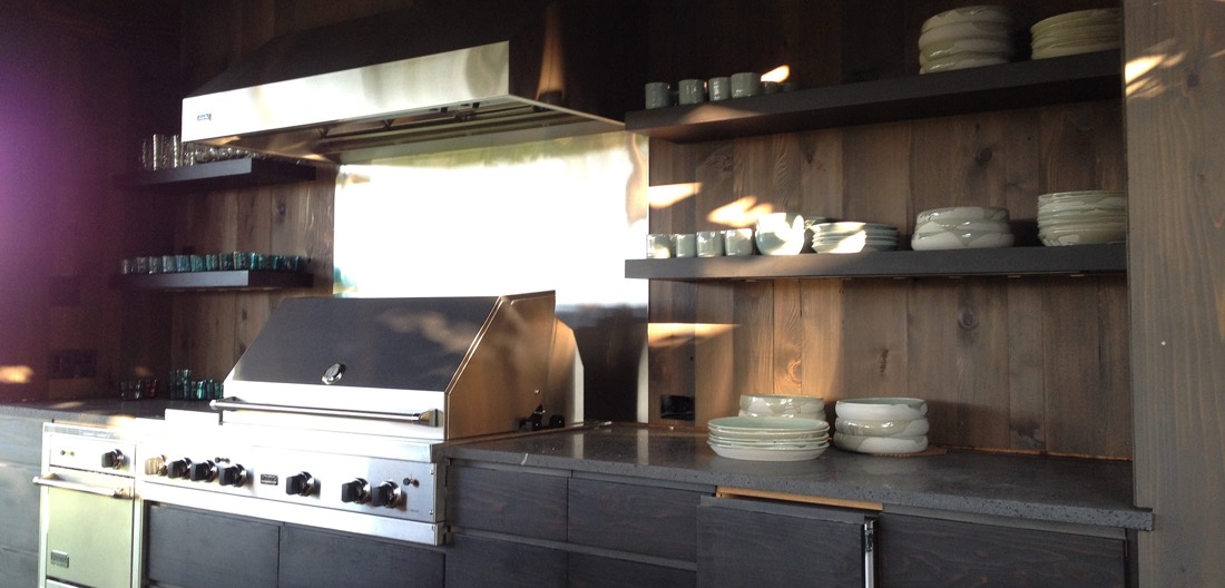 Kitchen with fir cabinetry and open shelving
