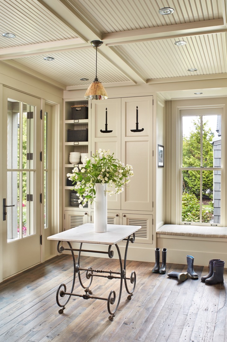Bright morning room with a coffered ceiling and built-ins